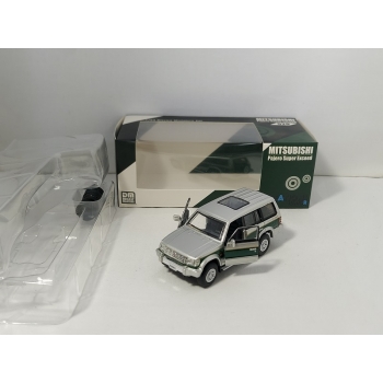 BM Creations 1:64 Mitsubishi Pajero 2nd Generation 1996 LHD silver with green stripe